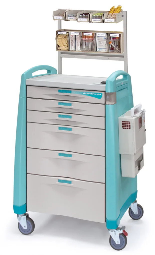 Turquoise and white medical cart with multiple drawers and overhead storage shelves containing medical supplies and equipment
