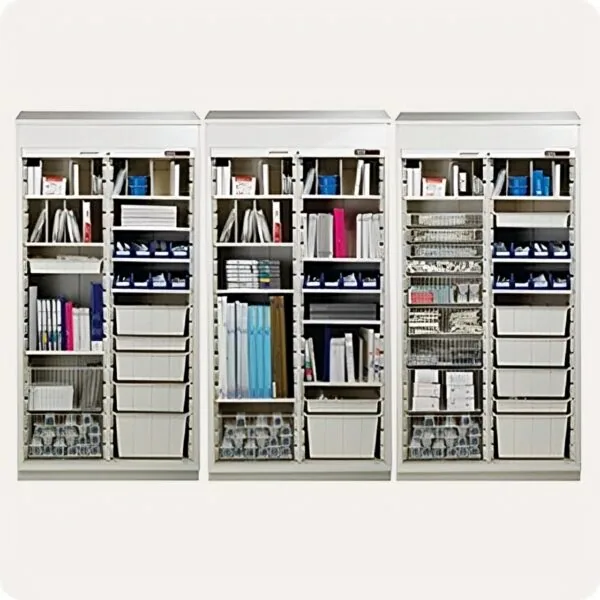 Three white tall storage cabinets with metal tops, each containing organized shelves with books, files, containers, and storage baskets in various arrangements
