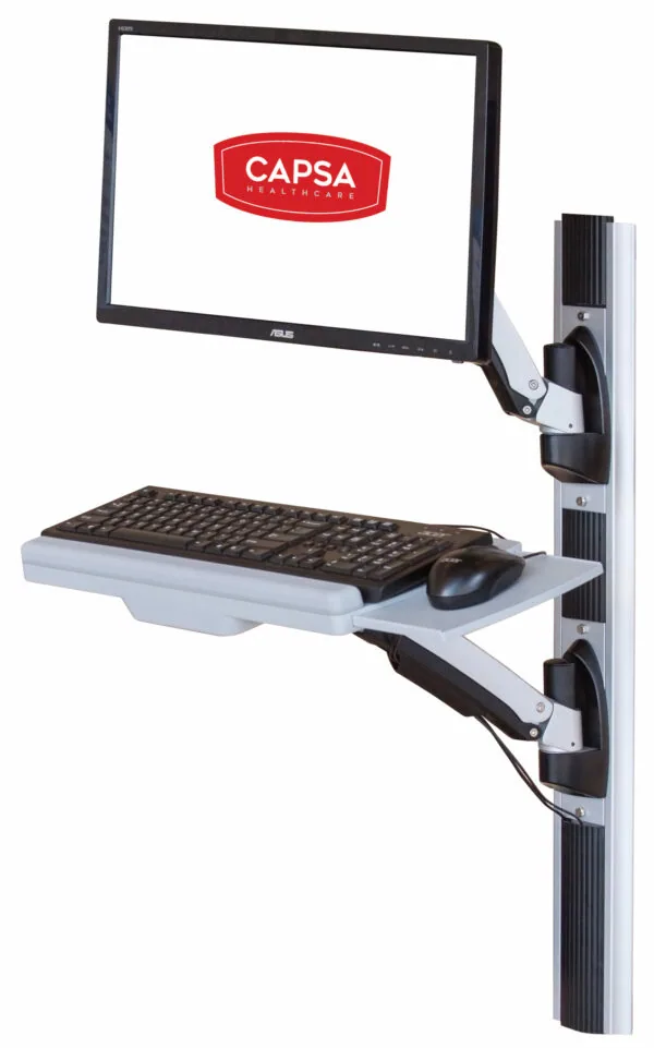 Wall-mounted articulating arm displaying monitor with CAPSA logo and keyboard tray with mouse