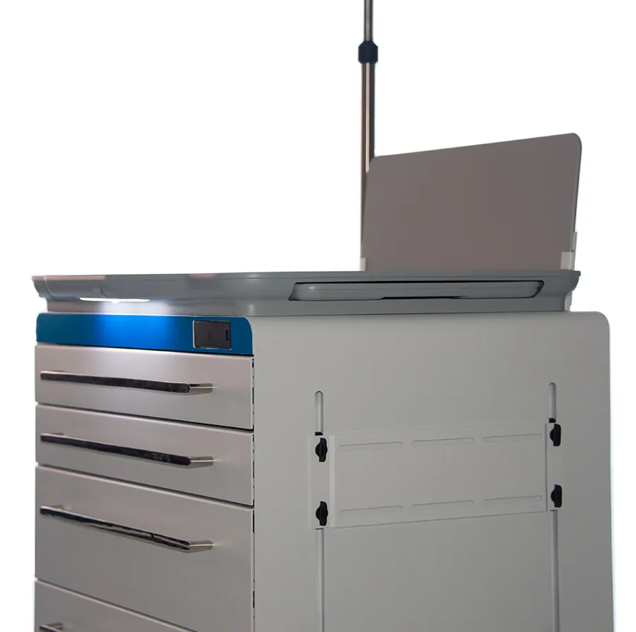 Medical equipment cart with gray drawers and white cabinet storage, topped with overhead monitor arm and suspended display screen