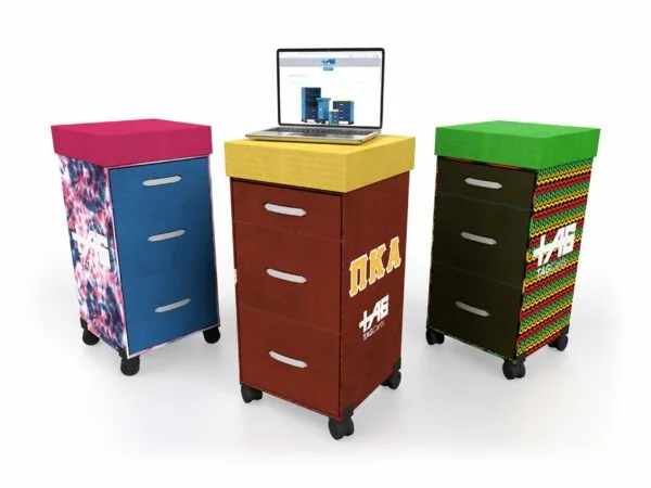 Three colorful mobile storage carts with drawers and caster wheels, center cart topped with yellow platform holding laptop displaying server image