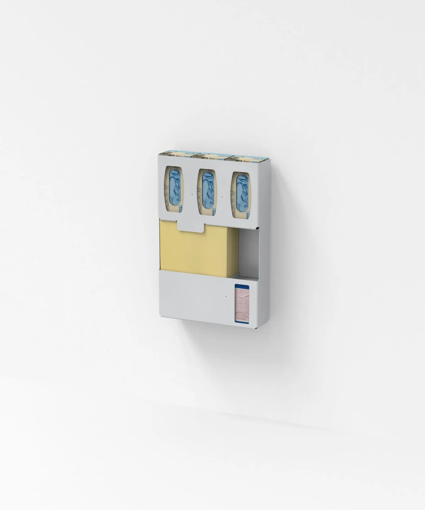 White wall-mounted dispenser with three roll compartments at top, yellow paper pad holder in center, and sanitizer dispenser at bottom