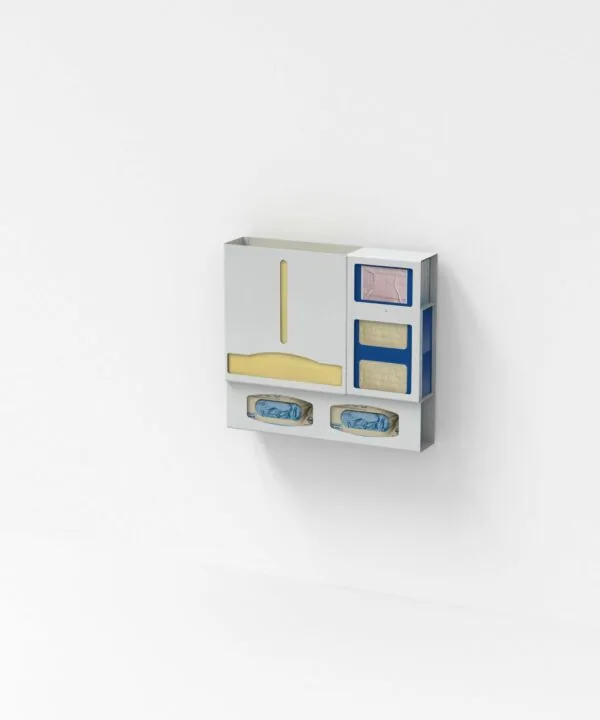 White wall-mounted organizer with compartments containing yellow and blue items, labeled drawers, and mesh pockets